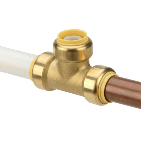 Brass push-to-connect tee fitting installed on pipes, suitable for use with Disconnect Tong For Brass Push To Connect Fittings One Half Inch Three Quarter Inch And One Inch Removal Tool For Demount In Tight Spots Easy Access Plumbing Hand Tool For Pro DIY And Contractors