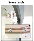 Close-up of 23mm diameter brass shower door wheels with nylon rollers and stainless steel screws installed on a glass door.