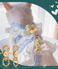 Heavy Duty Swivel Round Snap Clips 2 Pack 2.8 Inch Lobster Claw Hooks for pet leashes shown on a cat harness, brass material.
