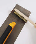 Soft Brass Bristle Wire Brush for Cleaning Metal Rust, Welds, Home and Kitchen, Wire Scratch Brushes with 10" Beechwood Handle in use
