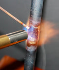 Workhorse Bare Bronze Brazing Rods Pack Low Fume Copper Alloy For Torch Welding shown in use on metal pipe joining