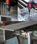 Five Eighths Inch Reamer Bit For Steel And Wood HSS Tapered Bridge Reamer Drill Bit With Half Inch Shank in action on steel.