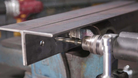 Pro Grade One Inch Bridge Reamer For Construction And Hole Alignment With Half Inch Shank DWR Series Heavy Duty Tool For Aligning Overlapping Holes Before Bolts Or Rivets Drill America in use on metal beam