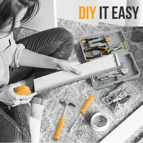 20 Piece Basic Tool Kit With Mini Toolbox For Home Repairs And Office Maintenance Easy To Use For Beginners And Gals Includes Hammer Adjustable Wrench Pliers Screwdrivers And More For DIY Projects And Everyday Fixes Bright Yellow displayed open on carpet with woman measuring.