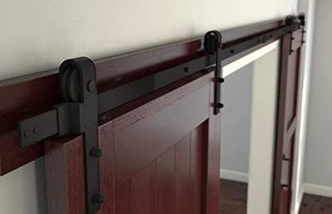 Oil-Rubbed Bronze Door Strap Hanger Pair For Sliding Door Track Kits With Installation Hardware Includes Two Hangers To Add An Extra Door To Your Sliding System Durable Steel Construction For Long Lasting Performance installed on wooden door and track
