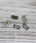 5 Pack Zinc Alloy Keyhole Covers in Bronze Tone for Dresser Furniture Lock Decoration Cabinets and Desks, 18x8mm size, top view.