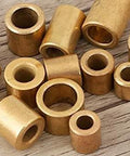 10 Pcs Sleeve Bearing Set With 10 Mm Bore 16 Mm Outer Diameter And 20 Mm Length Self Lubricating Bushings bronze on wood surface