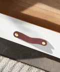 4 Pack Leather Cabinet Handles With Screws, Soft Brown Leather Pulls mounted on a white drawer for cabinets, wardrobes, and dressers.