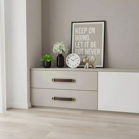 4 Piece Leather Cabinet Pulls And Luggage Handles Replacement installed on white drawers, featuring brown leather and pre-drilled holes.