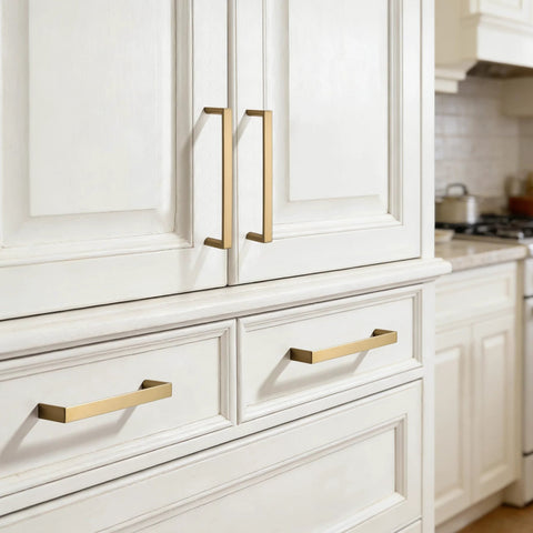 Brushed Brass Cabinet Pulls Set Of 10, 3-Inch Hole Center Handles for kitchen cabinets and drawers installed on white cabinets