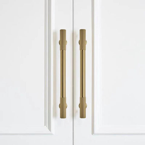 2 Pack 6 Inch Hole Center Brushed Brass Cabinet Pulls For Drawers Dressers And Cabinets installed on white cabinet doors