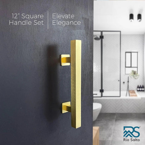 12 Inch Brushed Brass Vintage Gold Barn Door Handle Kit with flush plate, installed on a dark wood door