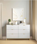 White dresser featuring Brushed Brass Aluminum Finger Pulls For Cabinets And Drawers, low profile back mount handles.