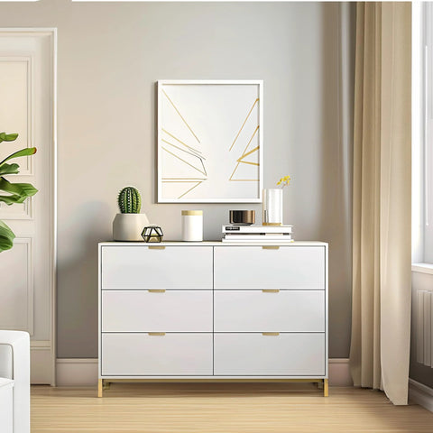 White dresser featuring Brushed Brass Aluminum Finger Pulls For Cabinets And Drawers, low profile back mount handles.