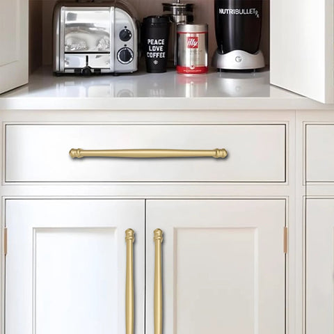 2 Pack 4 Inch Center To Center Brushed Gold Cabinet Pulls installed on white kitchen cabinets
