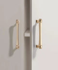 Brushed Gold Cabinet Pulls Set 10 Pack 5 Inch 128 Millimeters Solid Zinc Alloy Drawer Handles installed on cabinet