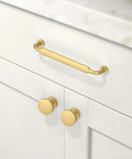 Brushed Gold Cabinet Pulls 5 Inch 128mm Pack Of 10 Kitchen Cabinet Handles installed on white drawer with smooth finish