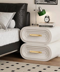 Modern bedroom with white nightstand featuring solid brass cabinet pull with backplate set of 2 in brushed gold finish and 5 inch hole centers.