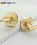 Brushed Gold Privacy Door Levers Set, 4 Pack For Bedroom And Bathroom, showing two levers on a white surface