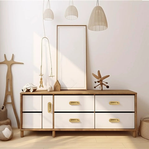 Six Piece Brushed Gold Stainless Steel Flush Pull Handles For Cabinets And Drawers, installed on a wooden dresser with hidden screws