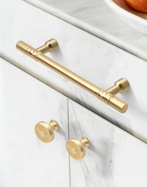 Brushed Gold Kitchen Cabinet Knobs 10 Pack Zinc Alloy Single Hole Round Drawer Pulls For Cabinets And Dressers installed on a white cabinet