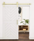 Brushed Gold 72 Inch Interior Sliding Barn Door Hardware One Piece Designer Kit with Soft Close shown installed