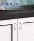 Brushed Nickel Cabinet Pulls 3 Inch Hole Center 30 Pack Zinc Alloy Handles Installed on White Cabinets in Kitchen