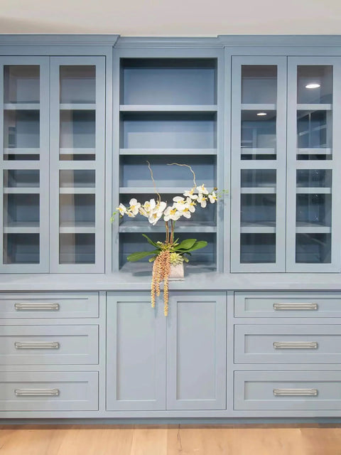 5 Pack 6 Inch Hole Center Brushed Satin Nickel Cabinet Pulls With Backplate installed on blue kitchen drawers