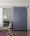 Eight Feet Brushed Nickel Sliding Barn Door Hardware Kit With I Shape Hanger For A 48 Inch Wide Door Panel installed in a bedroom