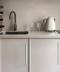 10-inch brushed nickel cabinet pulls on white kitchen cabinets, part of 30 pack 10 inch solid square cabinet pulls in brushed nickel