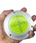 Hand holding high precision 100mm bubble level gauge for fast, accurate leveling with large, easy to read display and mounting holes