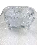 Crystal bowl wrapped in Bubble Cushioning Wrap For Fragile Items Perforated 12 Inch Roll 175 Ft Clear With Small Three Sixteenth Inch Bubbles