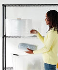 Person holding Bubble Cushioning Wrap For Fragile Items Perforated 12 Inch Roll 175 Ft Clear With Small Three Sixteenth Inch Bubbles