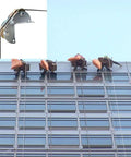 Pulley Hoist in use on building facade with workers, showcasing Material Handling and Moving Lifting with Tackle Pulley System