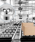Bulk Forty Pack Five Eighths Inch Roller Ball Transfer Bearings in carbon steel on a conveyor in an industrial setting