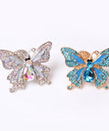 Butterfly Rhinestone Cabinet Knob Set 4 Piece Zinc Alloy Silvery Single Hole Pull Handles with crystal accents in blue and silver.