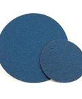 Blue abrasive discs, different sizes, used for sanding and polishing surfaces. Two discs are shown on a plain background.