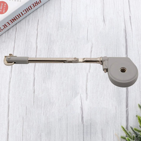 Satin silver Drop Down Short Cabinet Door Gas Strut Hydraulic Gas Spring with sturdy construction on a wooden background