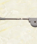 Drop Down Short Cabinet Door Gas Strut Hydraulic Gas Spring with satin silver finish on marble background