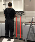 Person using ✝️ Cabinet Jack for Installing Cabinet，Adjustable 3rd Hand Support Pole Extend from 45 to 114 inches,Premium Steel