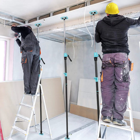 Workers using ✝️ Cabinet Jack Support Pole, 54-114 in Steel Telescopic Quick Support System Rod for lifting drywall, 4 Pack installed