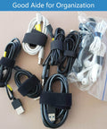 Coiled cables bundled with Double Sided Hook And Loop Straps For Quick Wrap Cable Bundling And Organization Heavy Duty 2 Inch Wide Self Gripping Nylon Roll