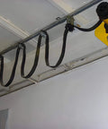 2 Wheel Cable Trolley Assembly Rollers with Dual Bearings for 1-5/8 Inch & Taller Strut Channel in a ceiling setup