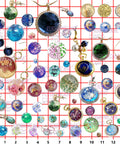 Variety of jewelry pieces made using cabochon gem resin silicone molds against a grid background.