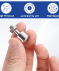 Cam Follower Track Runner Bearing With Beefed-Up 13mm Roller Diameter And 10mm Width, shown between fingers, highlighting size.