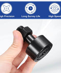 Hand holding uxcell CF-1-5/8-SB CR26 Cam Follower Track Runner Bearings, Chrome Steel Roller Stud Track Bearing, 1-5/8'' roller.