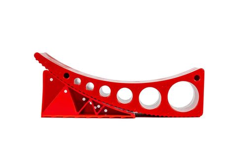 Side view of a red 2 Pack Camper Leveler System For RVs And Campers, Precise Half Inch To Four Inch Leveling, Andersen Hitches.