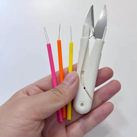 All In One Candle Making Kit For DIY Fans With Punching Needle Wick Insertion Tools shown in hand