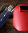 Durable Canvas And Leather Welding Rod Bag For Electrode Storage And Welding Tools next to red welding mask on wooden surface