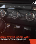HVAC system controls in a vehicle dashboard showing automatic temperature settings